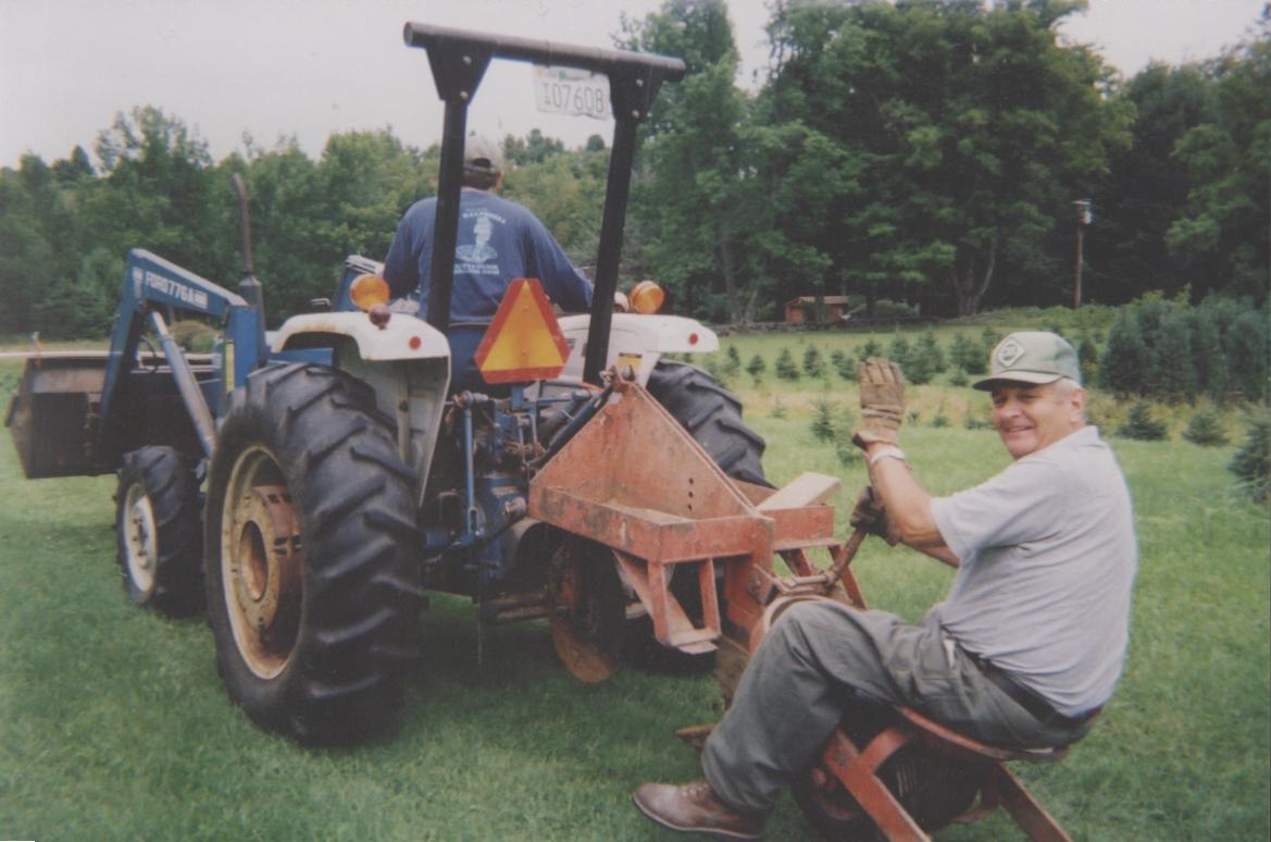 Robert riding the mower